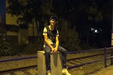 College guy wait For Bus Stop
