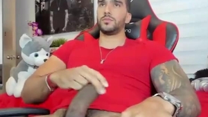 attractive Latino Hunk With Tattoos Strokes His large darksome cock