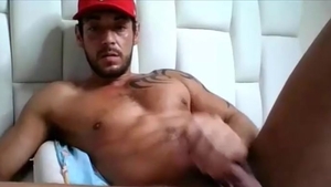 Tattooed And Bearded ebony man strokes him Quickly